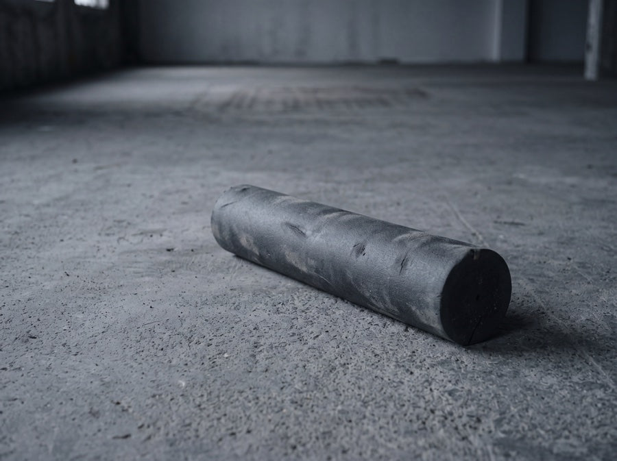 Foam roller on a cold concrete surface